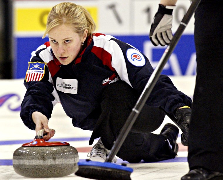 Team USA skip Cassie Johnson is pictured delivering a stone against Team Canada at the World Womens Curling Championship in Paisley, Scotland in this file photo. When Johnson competes with the U.S. curling team at the upcoming 2006 Winter Olympics in Italy, she'll have an expanded entourage cheering her on, all making the trip to Turin courtesy of Bank of America. 